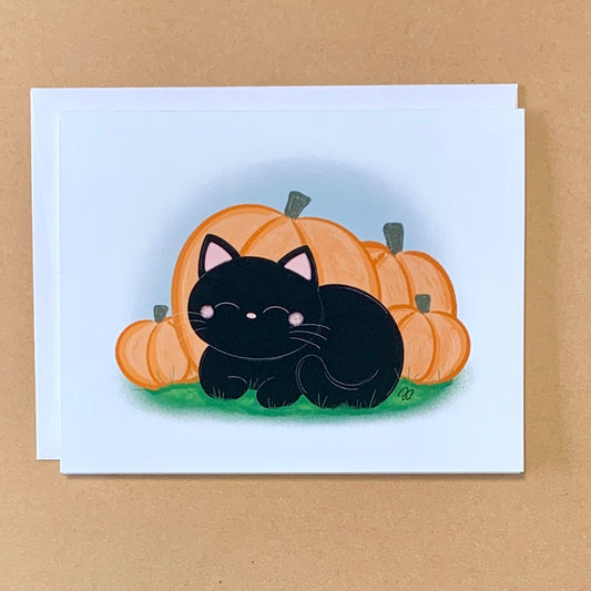 Black Cat in Pumpkin Patch